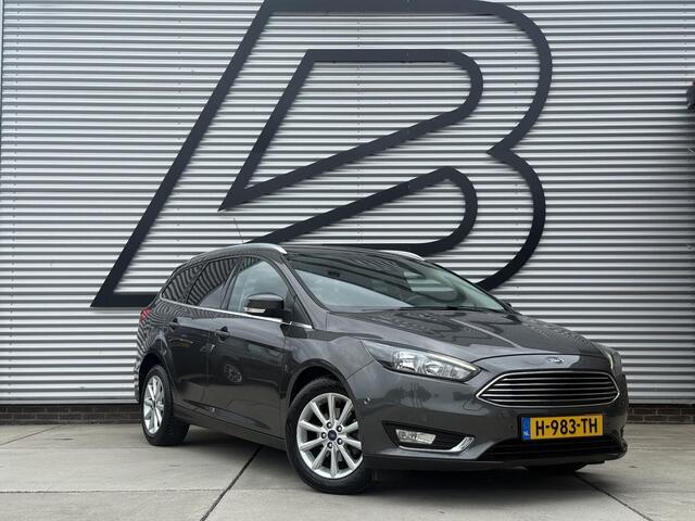 Ford FOCUS Wagon 1.0 Titanium 1e Eigenaar|Navi|Clima|Cruise|Carplay|Stoel+Stuur verw|PDC V+A|APK tot 12-2026