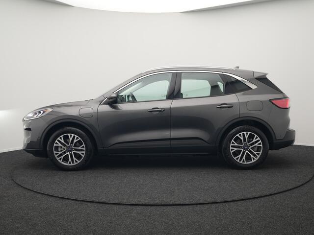 Ford KUGA 2.5 Titanium Plug in Hybride 225pk Dealer O.H PHEV | Trekhaak Af Fabriek | Head up | Adaptive cruise | Keyless | Park assist | Sportstoelen Verwarmd | Apple Carplay | Navigatie | Virtual | DAB |