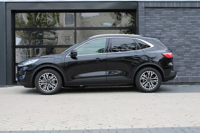 Ford KUGA 2.5 PHEV Titanium X | B&O | STOEL+STUURVERWARMING | ACHTERBANK VERWARMD | CRUISE |