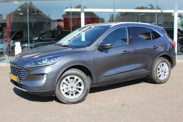 Ford KUGA 2.5-225pk PHEV Titanium X Plug-In Hybrid. Fabr. garantie t/m 07-04-2028 ! Slechts 10.000km ! Autm. airco dual, stoel-, stuur- en voorraamverw., LED verl., B&O soundsyst., metallic lak, cruise control, camera, LM wielen, elektr. achterklep en best. stoel e