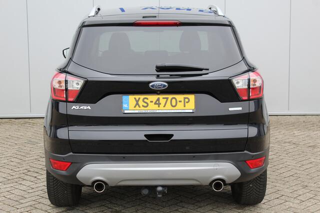 Ford KUGA 1.5-150pk EcoBoost Titanium. Trekgewicht 2.000kg ! Autm. airco dual, stoel-, stuur- en voorraamverwarming, cruise control, telefoonvoorb., navigatie, Sony soundsyst., LM wielen, trekhaak, privacy glass, All Season banden etc.