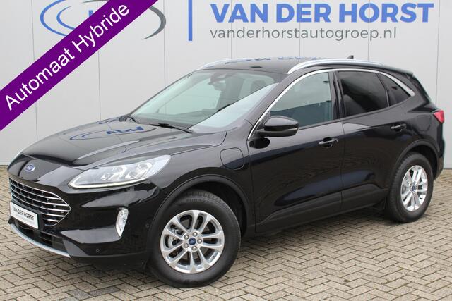 Ford KUGA 2.5-225 pk PHEV Titanium X. Hybride rijden voor een reële prijs ! Stoel-, stuur- en voorraamverw., navigatie, telefoonvoorb., B&O soundsyst., side- en lane assist, adaptieve cruise cntrl, elektr. achterklep, elektr. verstelb., best. stoel, lm wielen, keyl