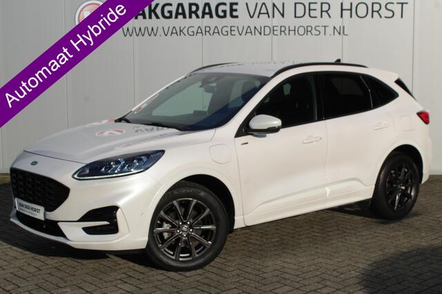 Ford KUGA 2.5-225pk Plug-in Hybrid ST-Line X. Hybride rijden voor een reële prijs ! Autm. airco dual, side- en lane assist, adaptieve cruise cntrl, camera v+a, stoel-, stuur- en voorraamverw., elektr. achterklep, metallic lak, navigatie, telefoonvoorb. etc.