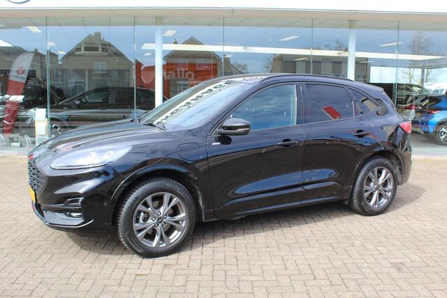 Ford KUGA 2.5-225pk Plug-in Hybrid ST-Line X. Hybride rijden voor een reële prijs ! Adaptive Cruise Control, Stoel- en voorraamverwarming, Climate Control, Metallic lak, Camera v+a, Elektr. achterklep, Side- en lane assist etc.