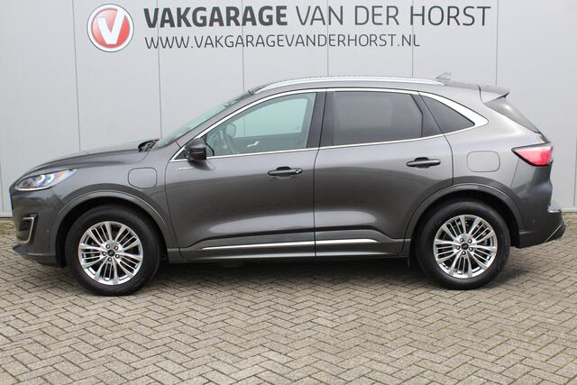 Ford KUGA 2.5-225pk PHEV 'Vignale' Plug-in Hybrid Automaat. Luxe hybride rijden voor een reëel bedrag ! Trekhaak, Adaptieve Cruise Cntrl, Climate Cntrl, Side- en lane assist, Head-Up display, Winter Pack, Driver Ass. Pack, Camera, Elektr. achterklep etc.