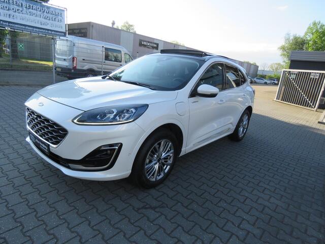 Ford KUGA 2.5 PHEV Vignale NAVI,ADAP CRUISE,PANODAK,ELEKTRISCHE TREKHAAK,LEER,WINTER PAKKET,APP CARPLAY. ARTIC WEISS METALLIC.