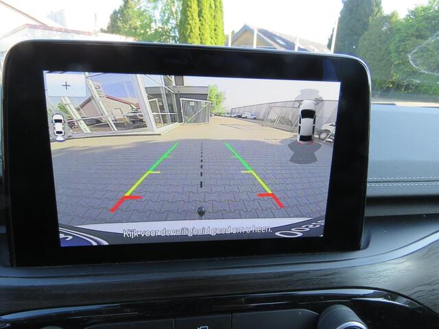 Ford KUGA 2.5 PHEV Vignale NAVI,ADAP CRUISE,PANODAK,ELEKTRISCHE TREKHAAK,LEER,WINTER PAKKET,APP CARPLAY. ARTIC WEISS METALLIC.