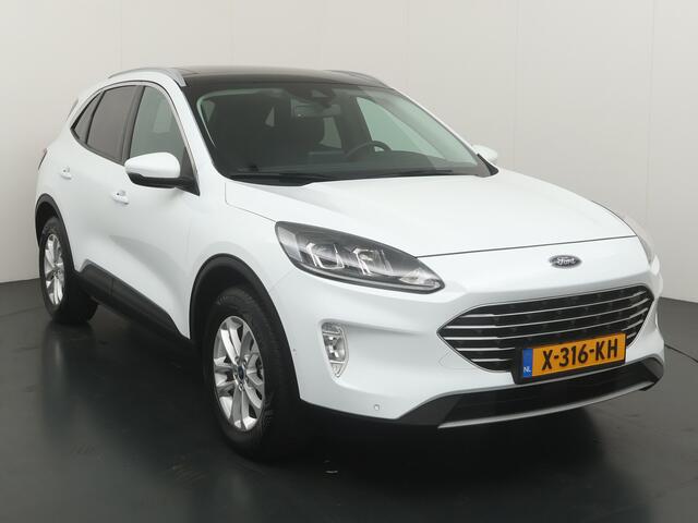 Ford KUGA 2.5 PHEV 225 pk Titanium | Trekhaak | Pano | Camera's | Adapt. cruise | 4 seiz. banden | 1e eig. | 100% dealer onderh.
