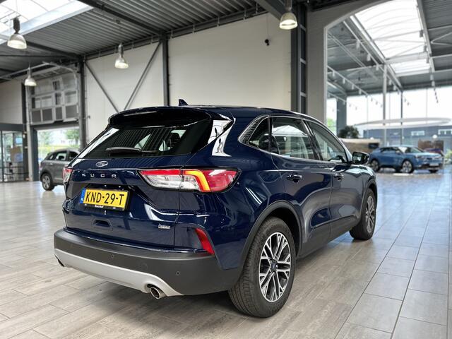 Ford KUGA 2.5 PHEV 225pk Titanium | Winterpack | Cruise control | Climate Control | Parkeersens V&A | Apple carplay / Android auto |