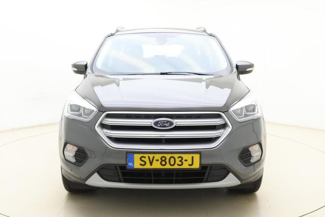 Ford KUGA 1.5 EcoBoost Titanium | Trekhaak | Achteruitrijcamera | Airco | Navigatie | Elektrische achterklep | Cruise control | Start/Stop bediening | Climate control | Parkeersensoren | Lederen/stof interieur | Stuurbediening