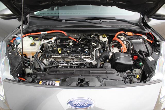 Ford KUGA 2.5-225 pk Titanium PHEV Plug-in Hybrid. Hybride rijden voor een gunstig bedrag ! Stuur-, stoel-, achterbank- en voorraamverw., lane- en side assist, camera v+a, adapt. cruise cntrl, autm. airco dual, camera v+a etc.