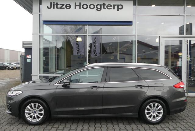 Ford MONDEO Wagon 2.0 IVCT HEV Titanium ELEKT. TREKHAAK (750KG), WINTER PACK, MEMORY, CRUISE, CLIMA, NAVI, CAMERA, PDC V&A, APPLE CARPLAY/ANDROID AUTO, BLIS, KEYLESS, ELEKT. PASSAGIERSSTOEL, ELEKT. ACHTERKLEP, ADAPTIEVE KOPLAMPEN, LANE ASSIST, 57.812KM