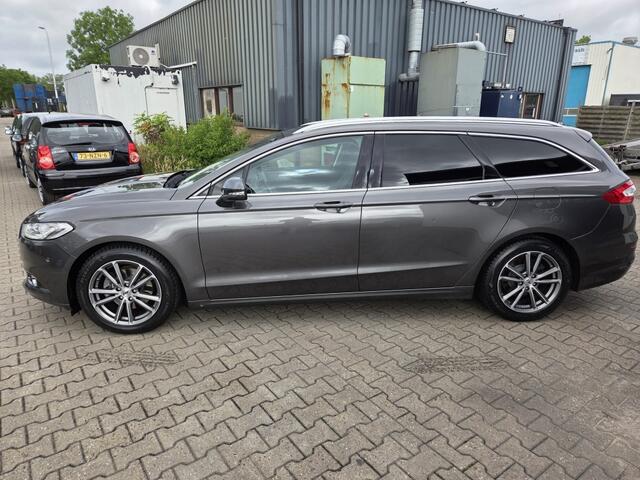 Ford MONDEO Wagon 1.5 TDCi Titanium/Leer/D.riem vervangen