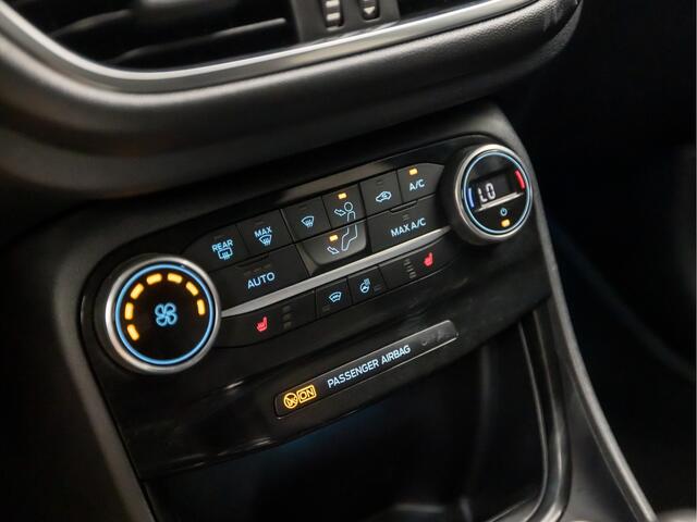 Ford PUMA 1.0 EcoBoost Hybrid ST-Line X First Edition (APPLE CARPLAY, GROOT NAVI, CLIMATE, STUUR/STOELVERWARMING, ADAPTIVE CRUISE, SPORTSTOELEN, CAMERA, KEYLESS, GETINT GLAS, LANE ASSIST, LM VELGEN, NIEUWSTAAT)