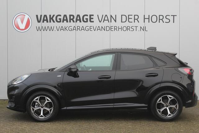 Ford PUMA 1.0-125pk EcoBoost Mild-Hybrid ST-Line. Mooie luxe hoogzitter ! Slechts 12.200km ! Autm. airco, adapt. cruise control, stoel-, stuur- en voorraamverw., navigatie, telefoonvoorb., LM wielen, elektr. achterklep, LED verl., camera, pdc v+a etc.
