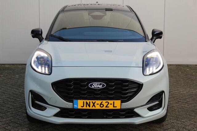 Ford PUMA 1.0-125pk EcoBoost Mild-Hybrid ST-Line. Mooie luxe hoogzitter ! Slechts 9.900km ! Autm. airco, adapt. cruise control, stoel-, stuur- en voorraamverw., navigatie, telefoonvoorb., LM wielen, elektr. achterklep, LED verl., camera 360gr, pdc v+a etc.