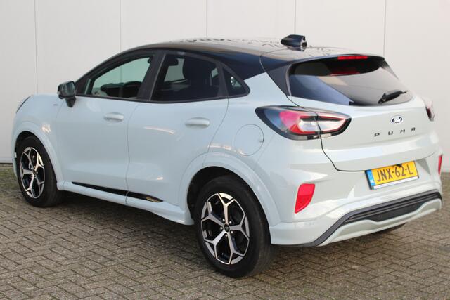 Ford PUMA 1.0-125pk EcoBoost Mild-Hybrid ST-Line. Mooie luxe hoogzitter ! Slechts 9.900km ! Autm. airco, adapt. cruise control, stoel-, stuur- en voorraamverw., navigatie, telefoonvoorb., LM wielen, elektr. achterklep, LED verl., camera 360gr, pdc v+a etc.