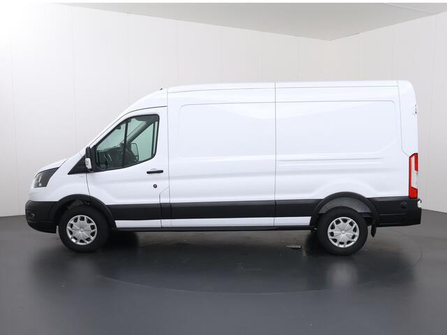 Ford TRANSIT 350 | 2.0 TDCI | L3 H2 | TREND | TREKHAAK 2500 KG AHW | CLIMATE CONTROL | NAVIGATIE | PARKEERSENSOREN V+A | CRUISE CONTROL | BIJRIJDERSBANK | LAADRUIMTE PAKKET | APPLE CARPLAY / ANDROID AUTO | STOEVERWARMING