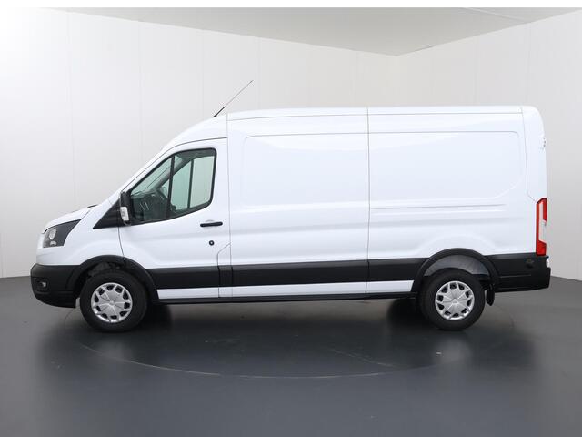Ford TRANSIT 350 | 2.0 TDCI | L3 H2 | Trend | TREKHAAK 2500KG AHW | CLIMATE CONTROL | NAVIGATIE | PARKEERSENSOREN V+A | CRUISE CONTROL | BIJRIJDERSBANK | LAADRUIMTE PAKKET | APPLE CARPLAY / ANDROID AUTO | STOEVERWARMING