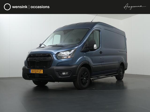 Ford TRANSIT 330 | 2.0 TDCI | L2 H2 | TREND | 170 PK | STOELVERWARMING | RAPTOR GRILLE | TRAIL VELGEN | PARKEERSENSOREN | TREKHAAK | DAB + | AIRCO | CRUISE CONTROL | METALLIC | NL | DEALER ONDERHOUDEN