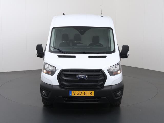 Ford TRANSIT 350 | 2.0 TDCI | L3 H2 | Trend | TREKHAAK 2500 KG AHW | CLIMATE CONTROL | NAVIGATIE | PARKEERSENSOREN V+A | CRUISE CONTROL | BIJRIJDERSBANK | LAADRUIMTE PAKKET | APPLE CARPLAY / ANDROID AUTO | STOEVERWARMING