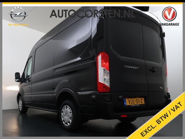 Ford TRANSIT 310 2.0 TDCI L2H2 3-Persoons Camera Airco Stoelverwarming Elek.Stoel Cruise Control Pdc Lane Assist Trend Betonplex Vloer Wandbetimmering Schuifdeur Voorruitverwarming 1e Eigenaar Origineel Nederlandse Bus