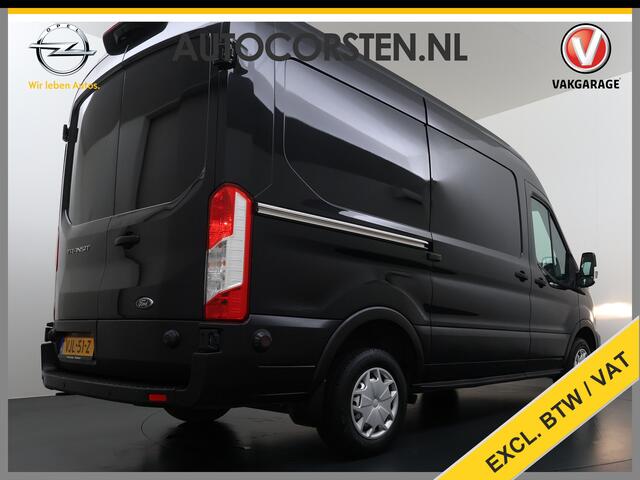 Ford TRANSIT 310 2.0 TDCI L2H2 3-Persoons Camera Airco Stoelverwarming Elek.Stoel Cruise Control Pdc Lane Assist Trend Betonplex Vloer Wandbetimmering Schuifdeur Voorruitverwarming 1e Eigenaar Origineel Nederlandse Bus