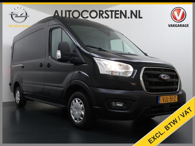 Ford TRANSIT 310 2.0 TDCI L2H2 3-Persoons Camera Airco Stoelverwarming Elek.Stoel Cruise Control Pdc Lane Assist Trend Betonplex Vloer Wandbetimmering Schuifdeur Voorruitverwarming 1e Eigenaar Origineel Nederlandse Bus