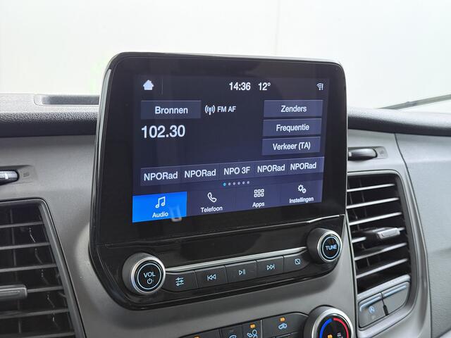 Ford TRANSIT 310 2.0 TDCI L2H2 3-Persoons Camera Airco Stoelverwarming Elek.Stoel Cruise Control Pdc Lane Assist Trend Betonplex Vloer Wandbetimmering Schuifdeur Voorruitverwarming 1e Eigenaar Origineel Nederlandse Bus