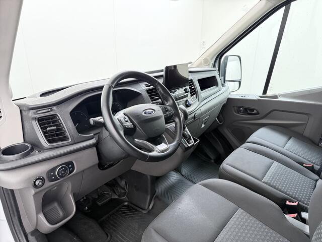 Ford TRANSIT 350 2.0TDCI 170PK Automaat L2H2 3-Persoons Trekhaak Euro 6 Navi Camera Cruise Control DAB Bluetooth Pdc Sidebars Betonplex Vloer Wandbetimmering 3.500KG Trekgewicht 1e Eigenaar Origineel Nederlandse Auto
