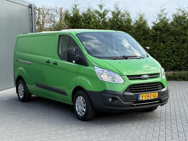 Ford TRANSIT CUSTOM 2.0 TDCI 131 PK E6 / L2H1 / 1e EIG. / 2.6 TONS TREKHAAK / AIRCO / CRUISE / NAVI / PDC