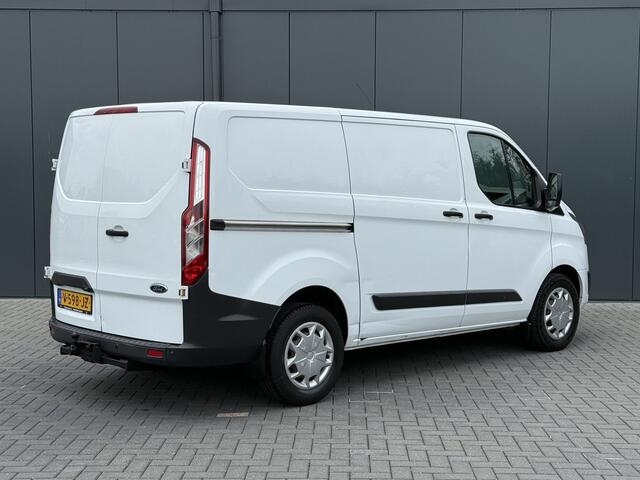 Ford TRANSIT CUSTOM 2.0 TDCI 130 PK / L1H1 / TREND / 2.5 TONS TREKHAAK / AIRCO / CRUISE / NAVI / INRICHTING / 3-ZITS