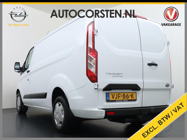 Ford TRANSIT CUSTOM 280 2.0TDCI 130PK L1H1 3-Persoons Apple Carplay Android Auto Airco Trekhaak Camera Cruise Control Pdc Voorruitverwarming Trend Regen-Lichtsensor Betonplex Vloer Wandbetimmering Schuifdeur Euro 6 385NM Koppel Zeer Compleet!