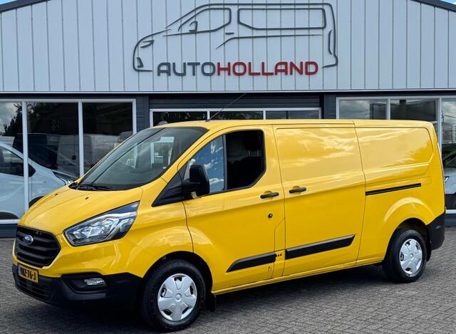 Ford TRANSIT CUSTOM 2.0 TDCI 77KW 105PK L2H1 EURO 6 AIRCO/ NAVIGATIE/ CRUISE CONTROL/ TREKHAAK/ 100% DEALERONDERHOUDEN