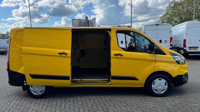 Ford TRANSIT CUSTOM 2.0 TDCI 77KW 105PK L2H1 EURO 6 AIRCO/ NAVIGATIE/ CRUISE CONTROL/ TREKHAAK/ 100% DEALERONDERHOUDEN