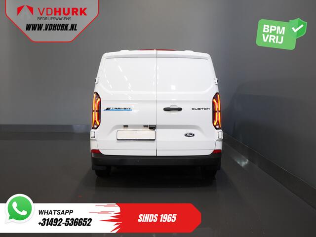 Ford TRANSIT CUSTOM E-Transit 320 L2 65 kWh 330 km WLTP 2.3t Trekverm./ Snellader/ LED/ Standkachel/ Stoelverw./ Stuur.Verw./ Voorruit.Verw./ Carplay/ Camera/ Climate/ PDC/ Cruise