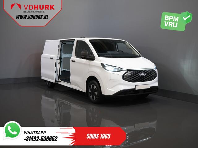 Ford TRANSIT CUSTOM E-Transit 320 L2 65 kWh 330 km WLTP 2.3t Trekverm./ Snellader/ LED/ Standkachel/ Stoelverw./ Stuur.Verw./ Voorruit.Verw./ Carplay/ Camera/ Climate/ PDC/ Cruise