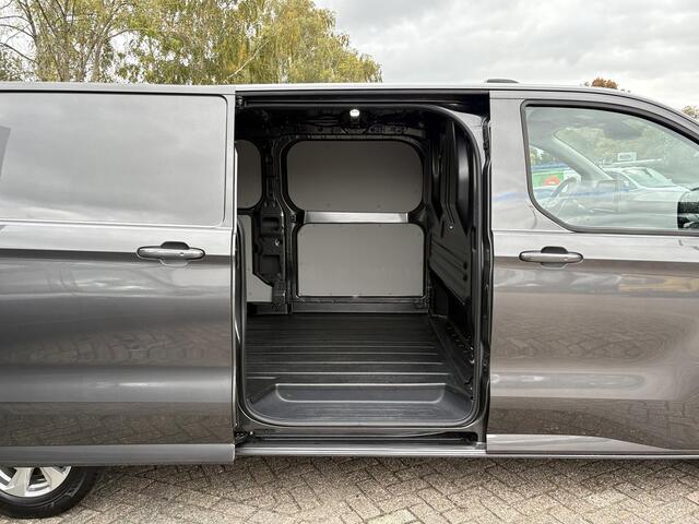 Ford TRANSIT CUSTOM 320 2.0 TDCI L2H1 Limited | SCI |136pk | Trekhaak | Stoel- & Stuurwielverwarming | Navigatie | LM Velgen | Doorschuifluik | Passagiersbank |