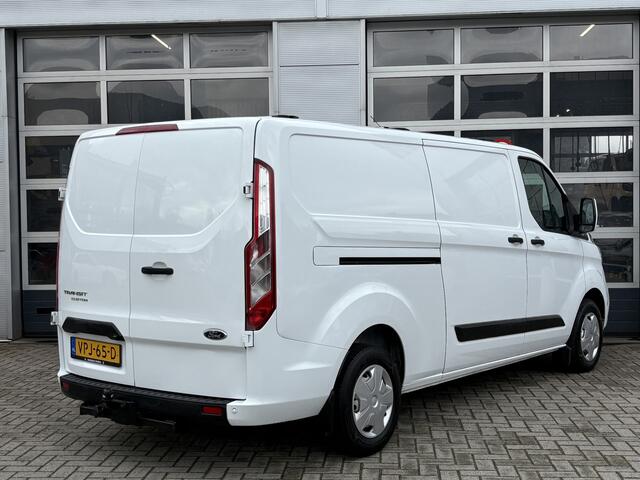 Ford TRANSIT CUSTOM 300 2.0 TDCI L2H1 Trend | Navigatie/Android/Apple Carplay | Trekhaak | Ingerichte Laadruimte | Voorstoelen Verwarmd | Cruise Control |