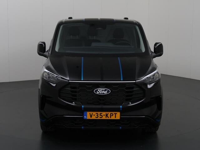 Ford TRANSIT CUSTOM 300 2.0 TDCI 170 PK L2 H1 SPORT | Aut. | AUTOMAAT | 2X ZIJSCHUIFDEUR | BLIND SPOT | STOELVERWARMING | STUURWIELVERWARMING | KEYLESS GO | ADAPTIEVE CRUISE CONTROL | 19" VELGEN | NAVIGATIE | CARPLAY | ANDROID AUTO | NIEUW