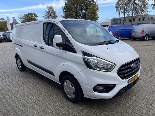 Ford TRANSIT CUSTOM 300 2.0 TDCI 130pk L2H1 Trend / vaste prijs rijklaar ¤ 14.950 ex btw / euro 6 / bpm vrij / lease vanaf ¤ 252 / airco / cruise / navi / camera / trekhaak 2700 kg !