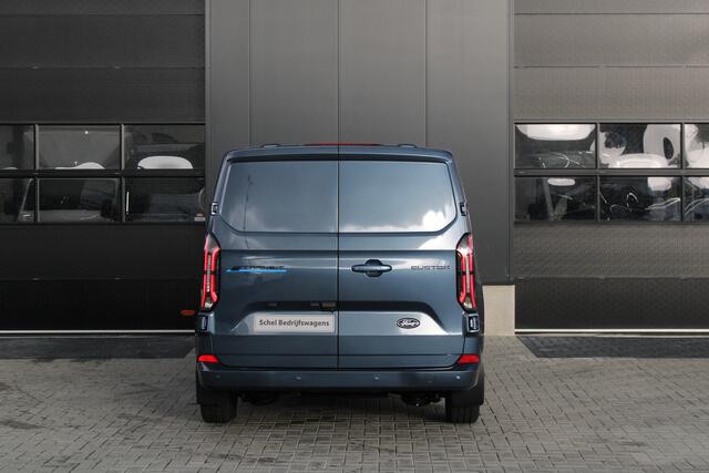 Ford TRANSIT CUSTOM E-Transit 340 L2H1 Limited 65 kWh 218pk - 2x Schuif - LED - 360 Camera - B&O - ACC - Navi - Stoel/Stuurverwarming - Rijklaar