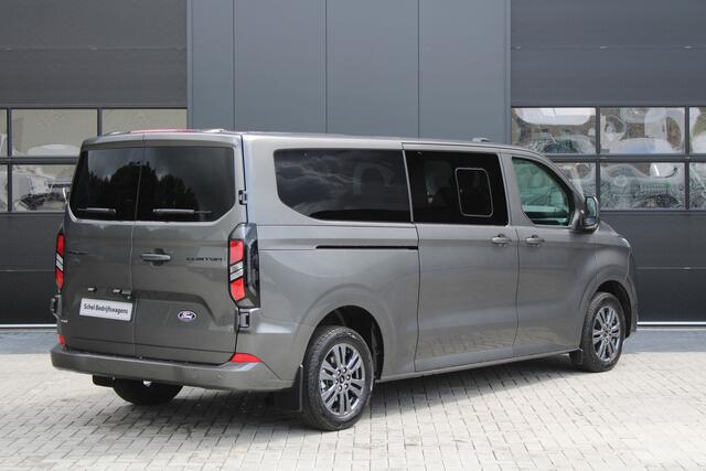 Ford TRANSIT CUSTOM 320 2.5 PHEV L2H1 Limited 232pk 8 Zits - 2x Schuif - Adaptive Cruise - Klimaat achterin - Keyless - Stoel/Stuurverwarming - Excl BTW - Rijklaar