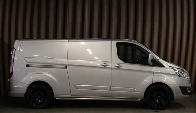 Ford TRANSIT CUSTOM 290 2.0 TDCI 170 PK L2H1 Limited | Standkachel | Navigatie | Stoelverwarming | Camera | Cruise control | Trekhaak | NAP Logisch | Dakdragers | Airco | 3-Zitter