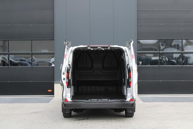 Ford TRANSIT CUSTOM 320 2.5 PHEV L2H1 Trend 232pk - 5 jaar GARANTIE - 2x Schuifdeur - Adaptive Cruise - Blind Spot - Navigatie - Camera - Verwarmd Stuur - Rijklaar