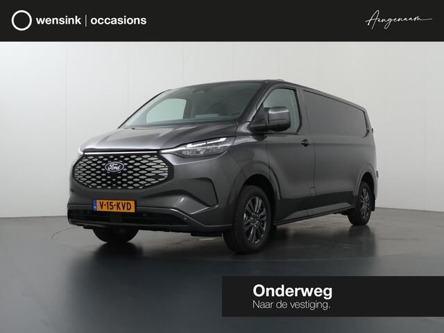 Ford TRANSIT CUSTOM E-Transit 340 | L2 H1 | LIMITED | 65 kWh | 218 PK | 328 KM WLTP | ADAPTIVE CRUISE | LED | STOELVERWARMING | PARKEERPAKKET | NAVIGATIE | 2-ZITS | ELEKTRISCHE TREKHAAK | LAADRUIMTE PAKKET | SNEL LADEN | CARPLAY / ANDROID AUTO | 2300 KG AHW