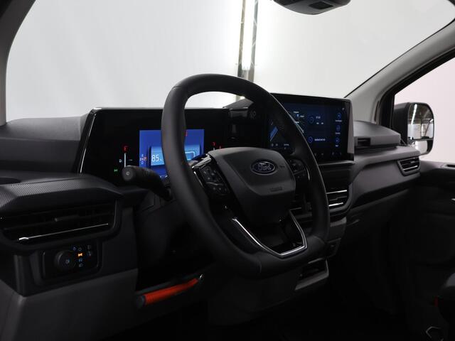 Ford TRANSIT CUSTOM E-Transit 340 | L2 H1 | LIMITED | 65 kWh | 218 PK | 328 KM WLTP | ADAPTIVE CRUISE | LED | STOELVERWARMING | PARKEERPAKKET | NAVIGATIE | 2-ZITS | ELEKTRISCHE TREKHAAK | LAADRUIMTE PAKKET | SNEL LADEN | CARPLAY / ANDROID AUTO | 2300 KG AHW