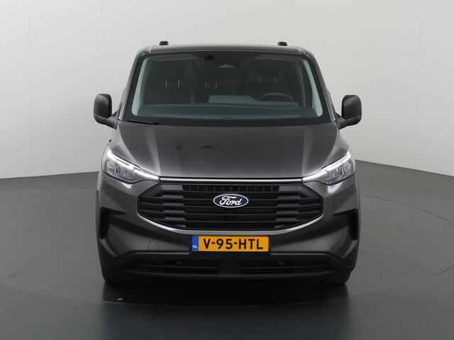 Ford TRANSIT CUSTOM 320 | 2.0 TDCI | L2 H1 | TREND | BPM VRIJ! | CAMERA | CRUISE CONTROL | CLIMATE CONTROL | CARPLAY ANDROID AUTO | 2800 KG AHW MOGELIJK | COMFORT BESTUURDERSTOEL | ACHTERKLEP | STOELVERWARMING