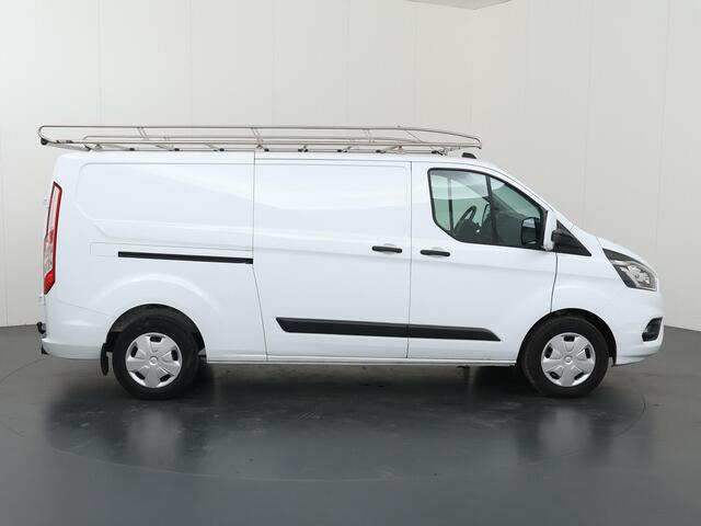 Ford TRANSIT CUSTOM 320 | 2.0 TDCI | L2 H1 | TREND | AUTOMAAT | AIRCO | CRUISE CONTROL | CAMERA | STOELVERWARMING | STOEL - STOEL | APPLE CARPLAY EN ANDROID AUTO | TREKHAAK | PARKEERSENSOREN