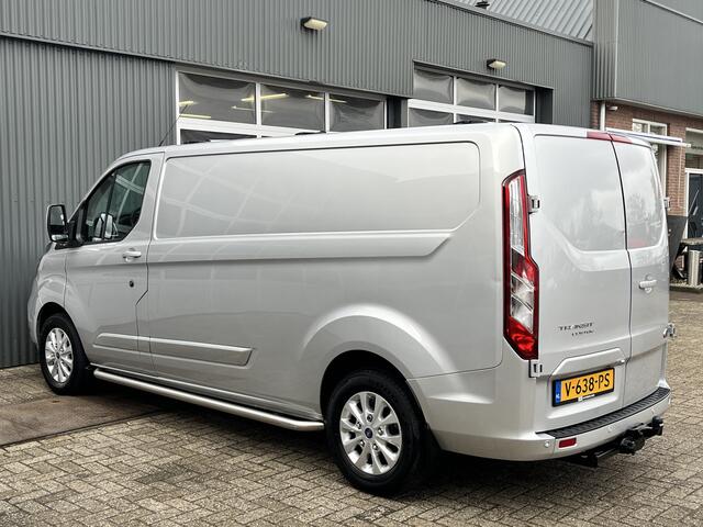Ford TRANSIT CUSTOM 300 2.0 TDCI L2H1 Limited Airco Cruise control Trekhaak 2800kg trekgewicht 3-Persoons Stoelverwarming Telefoonverbinding Achterruitrij camera Parkeersensoren voor en achter Schuifdeur Euro 6